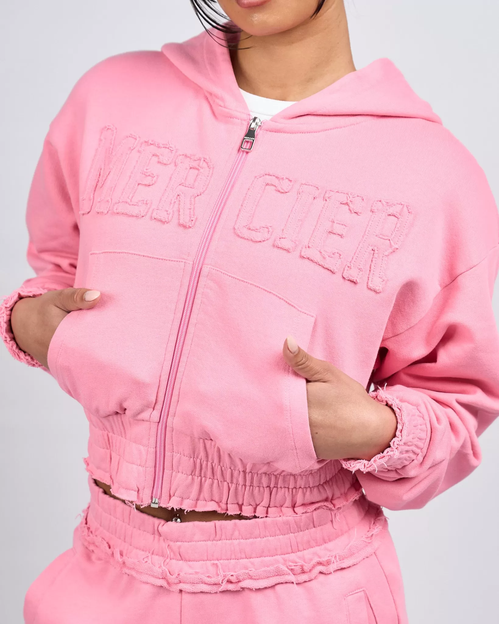Store Mercier Felpa con cappuccio rosa con croppata in difficoltà da donna