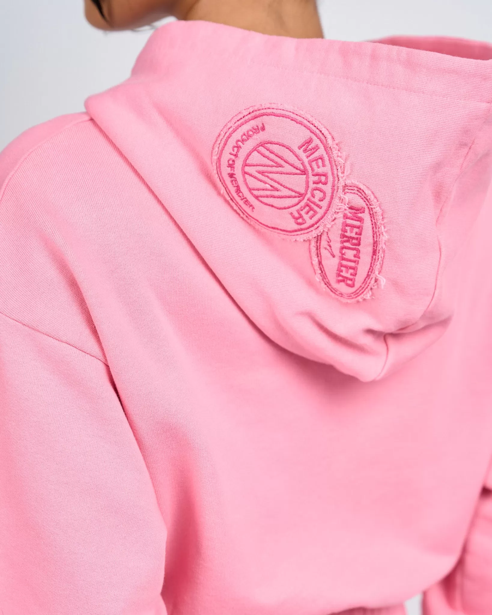 Store Mercier Felpa con cappuccio rosa con croppata in difficoltà da donna
