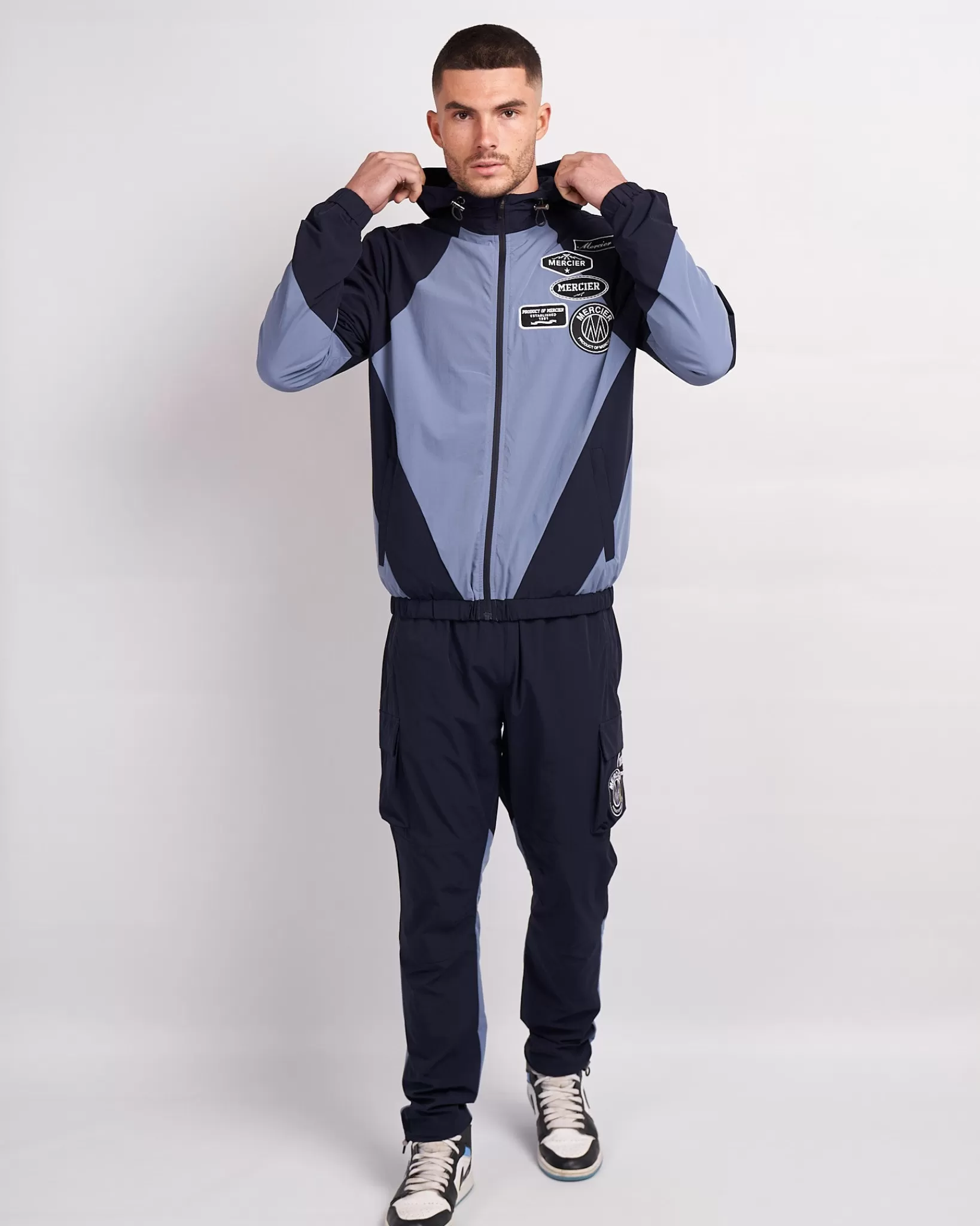 Store Mercier Giacca a vento con pannelli blu navy placid mono distintivo