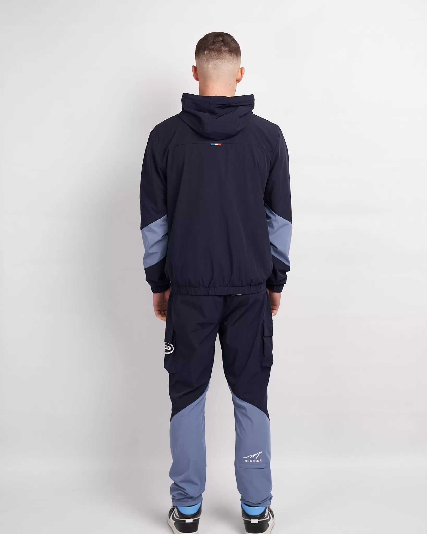 Store Mercier Giacca a vento con pannelli blu navy placid mono distintivo