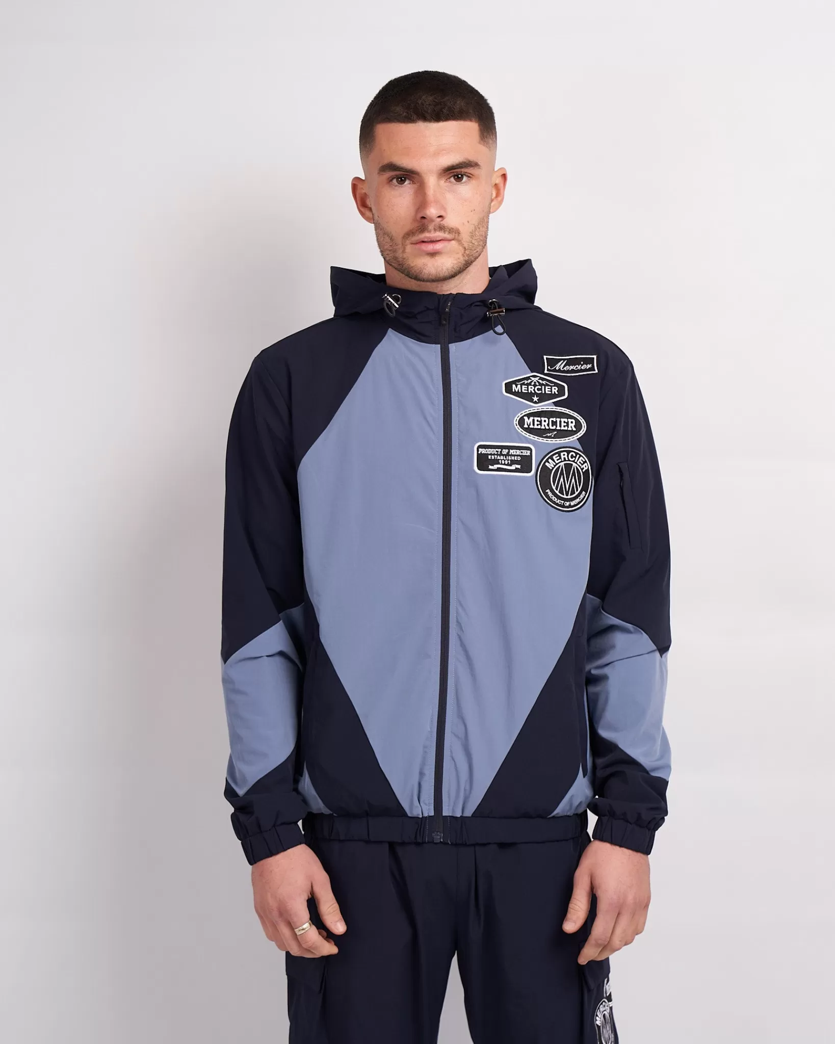 Store Mercier Giacca a vento con pannelli blu navy placid mono distintivo